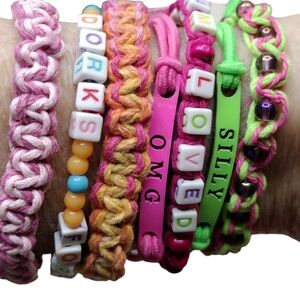 Lot of 7 Friendship Bracelet's pink green pull size bands and stretch OSFM